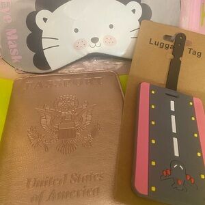 Elegant Embossed Passport Holder with sleep mask.